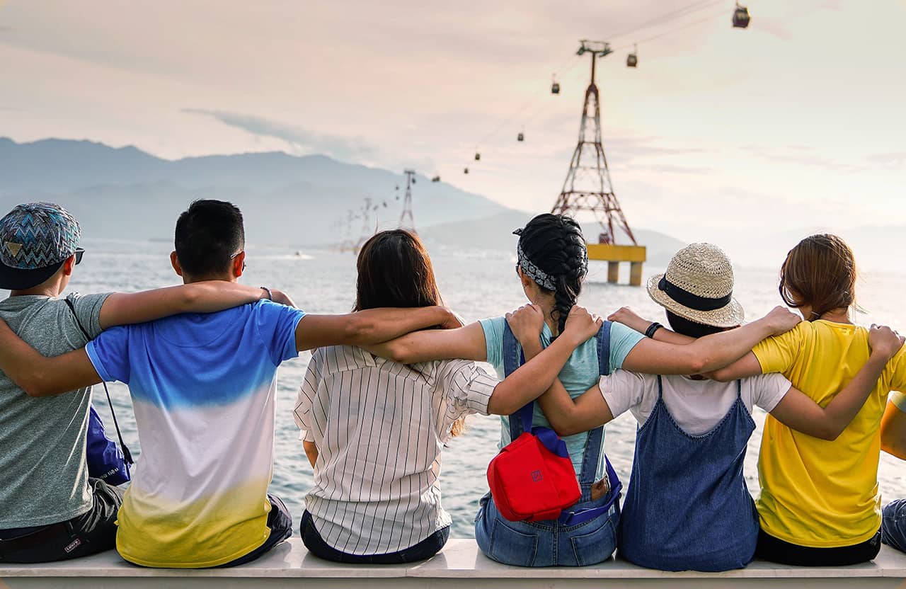 Friends Sitting at the Beach 1